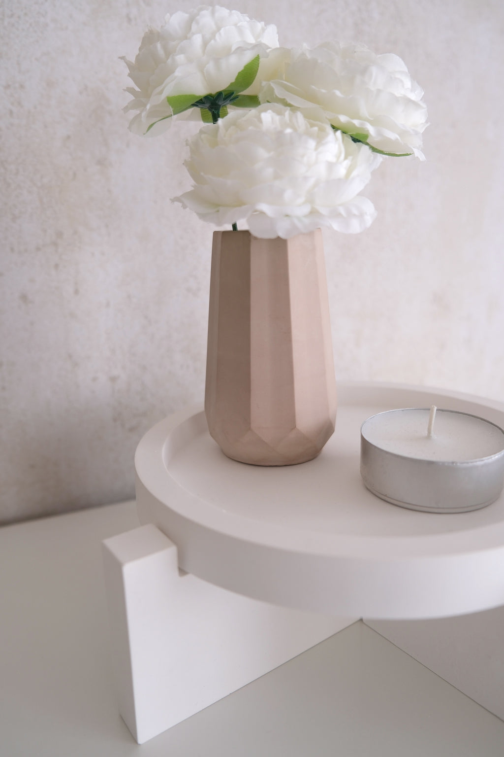 Display with small vase